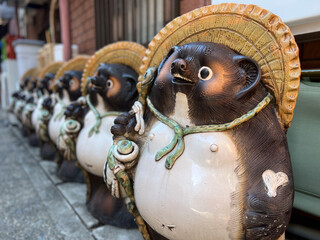 Funny tanuki statues in the streets of Tokyo