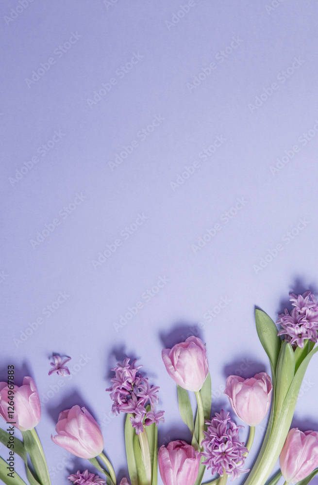 Wall mural spring flowers on purple paper background