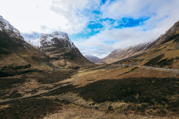 Exploring scenic Skye Island in Scotland with majestic mountains and rolling hills
