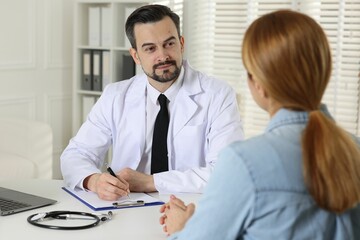 Woman having appointment with cardiologist in clinic