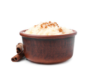 Tasty rice pudding with cinnamon isolated on white