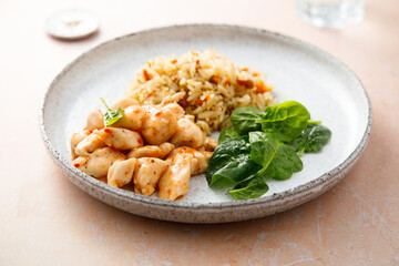 Fried rice with chicken and spinach