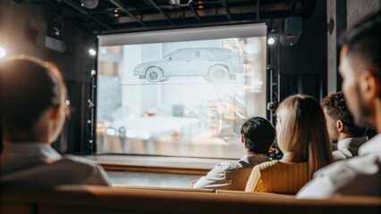 A dazzling holographic presentation illustrating innovative technology as the audience leans forward eager to learn more.