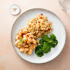 Fried rice with chicken and spinach