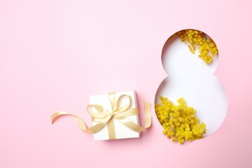8 March greeting8 March greeting card design with mimosa flowers and gift box, top view. Happy International Women's Daycard design with mimosa flowers, top view. Happy International Women's Day
