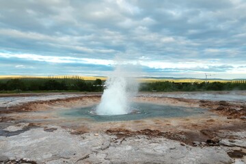 hot geyser in iceland, sulfurous water, water explosions, national park, yellowstone park, nature trip, natural wonders