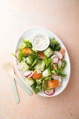 Leaf salad with salmon