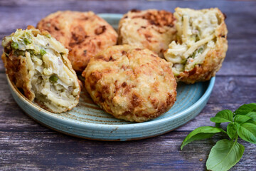 Frittatina di Pasta.Neapolitan Fried Pasta Street Food .Аuthentic Italian dish. Made with layers of pasta, cheeses, and prosciutto 