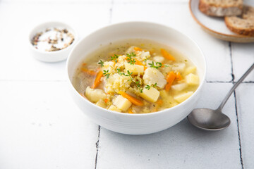 Homemade clear soup with cauliflower