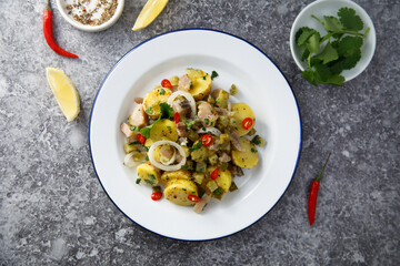Homemade potato salad with herring