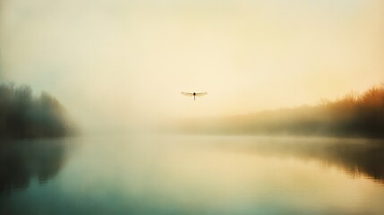 A lone dragonfly soars across a misty lake at dawn, encapsulating solitude and the calm break of a new day.