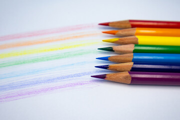 Useful office supplies such as colorful pencils and coloring
