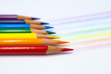 Useful office supplies such as colorful pencils and coloring