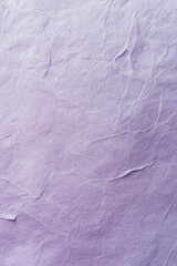 Naklejka premium Close-up of crumpled lavender-colored fabric with texture and wrinkles.