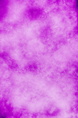 Closeup of rough pink wall with uneven pattern.