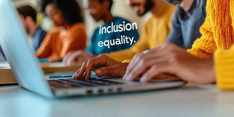 Diverse Individuals Using Laptops in Collaborative Workspace