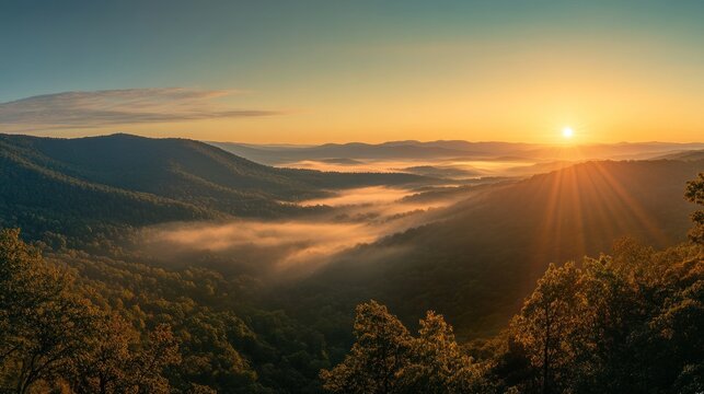 Breathtaking sunrise view over misty mountain valley landscape beauty - Powered by Adobe