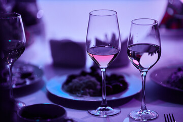 Elegant Wine Glasses with Wine on a Table