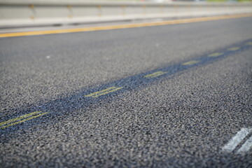 Close-Up of Freshly Laid Asphalt on New Highway Road with Clear Markings