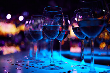 Elegant Wine Glasses with Wine on a Table
