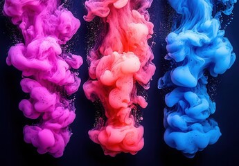 Obraz premium Vibrant swirls of colorful ink creating dynamic patterns in water. A stunning display of fluid motion and artistic expression.