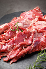 Photos of pork cuts used in butcher shop menus