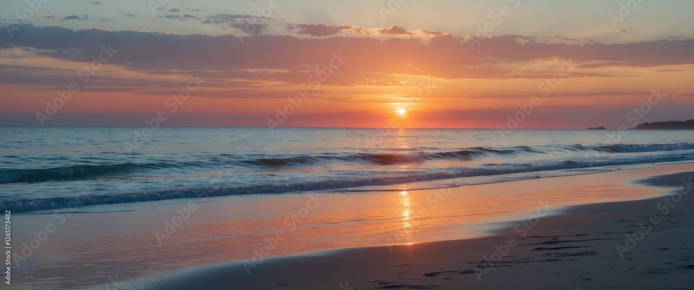 Poster Sunset over calm ocean waves with reflections on sandy beach and colorful sky clouds at twilight Copy Space