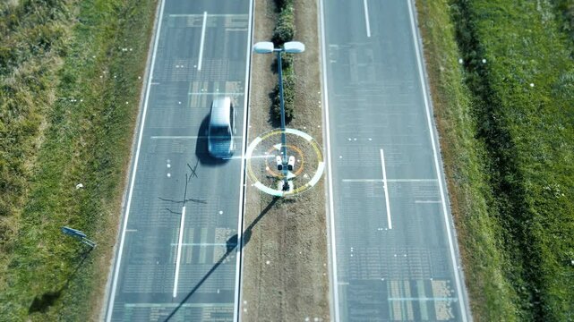 Top-down aerial view of highway with heavy traffic. Surveillance camera uses advanced software and scanning technology to monitor and track vehicles, data collection, loss of privacy