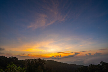 scenery sweet sky at twilight above The hills in the foreground add depth and contrast to the misty valleys in the distance. atmospheric scene that beautifully  majesty of nature.
