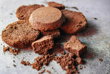 Close-up of coffee grounds from espresso machine. coffee ground on gray background