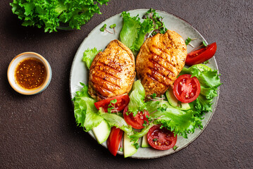 Grilled chicken breast and vegetable salad