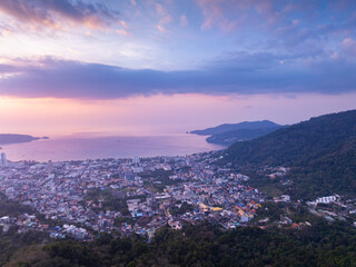 Aerial view of beautiful sunset sky over sea at Patong bay Phuket city Thailand