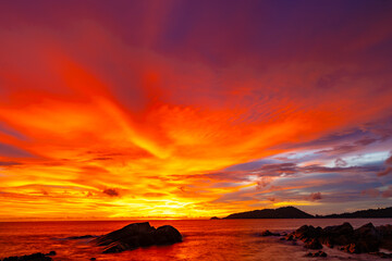 Landscape of colorful clouds in sunset or sunrise sky over sea with reflection in the tropical sea,Beautiful seascape scenery,Amazing light of nature Landscape nature background