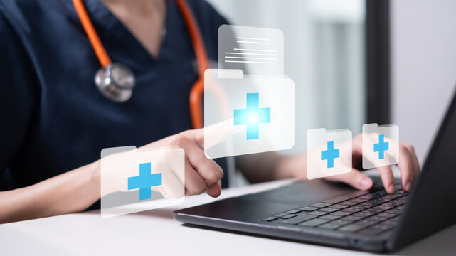 Close-up Medical doctor physician hand electronic medical record on computer tablet document