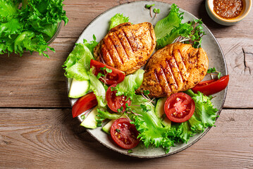Grilled chicken breast and vegetable salad