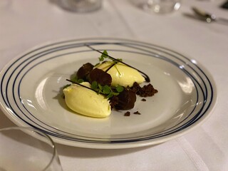White Chocolate Namelaka with rich dark chocolate pieces, praline feuilletine, and a refreshing vanilla ice pop—an ideal sweet ending to our first evening. Sydney, Australia - November 7, 2019