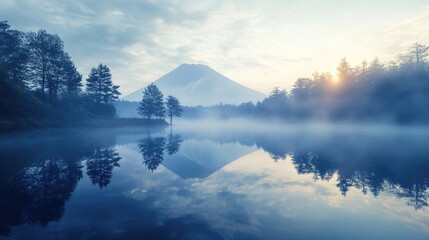 Serene Sunrise at Mountain Lake with Misty Reflection