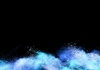 Abstract powder splatted background. blue powder explosion on black background. Colored cloud. Colorful dust explode. Paint Holi	