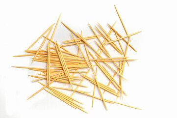 A Pile of Toothpicks on a White Background