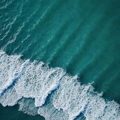 Fototapeta premium Aerial view beautiful of sea waves from drone. Stock image of blue color of ocean water, sea surface. Top view on turquoise waves, clear water surface texture.
