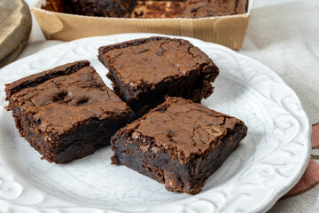 American chocolate brownie, dark chocolate baked dessert bar fudgy or cakey sweet dessert