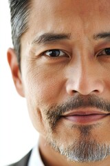 Obraz premium Close-up Portrait of a Confident Asian Man with Goatee