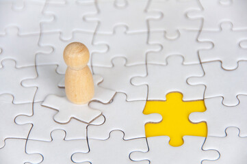 Wooden figure selected for vacant position. Recruitment concept