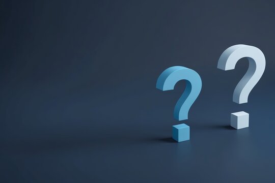 a close up of two question marks on a blue surface