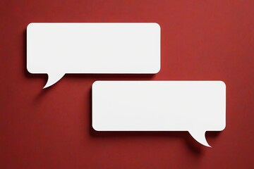 Fototapeta premium two white speech bubbles on a red background with shadows
