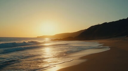 Naklejka premium Sunset beach waves ocean cliff landscape