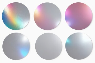 a close up of a set of four different colored mirrors
