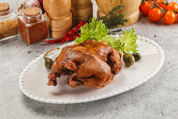 Baked small chicken with spices