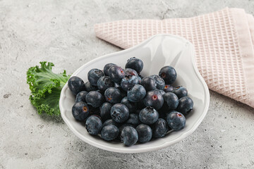 Sweet ripe blueberry on the bowl