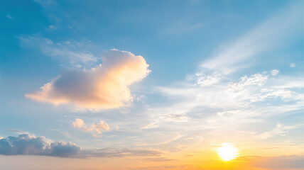 Obraz premium Drifting clouds in vibrant sky during sunset create serene atmosphere